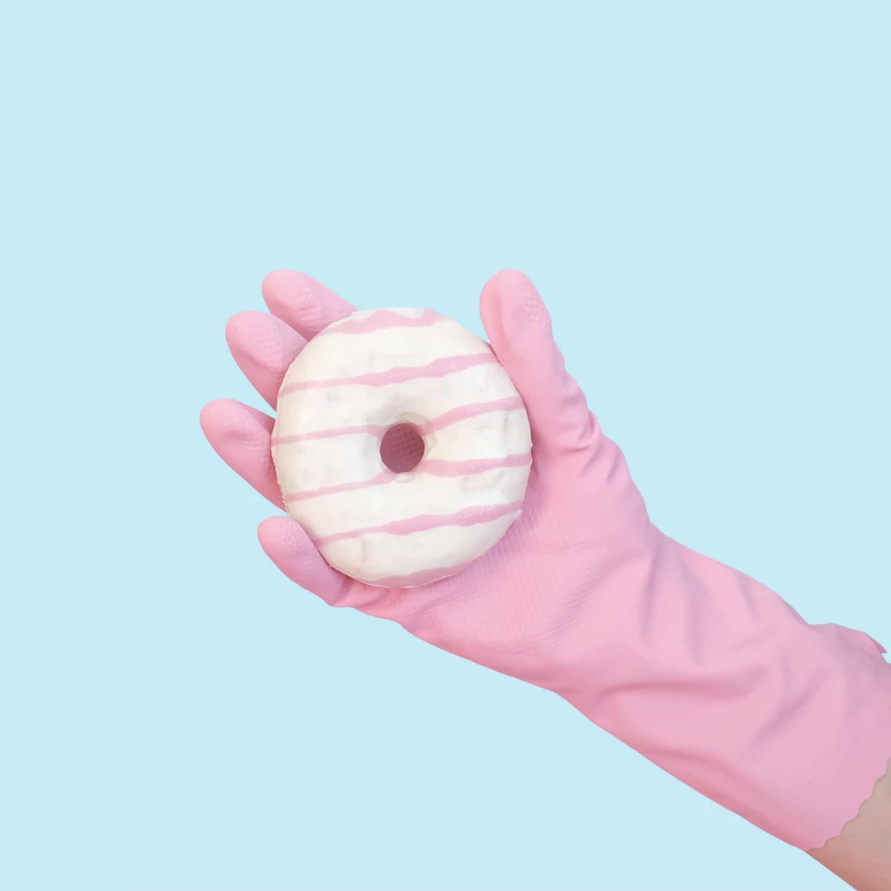 Hand holding donut